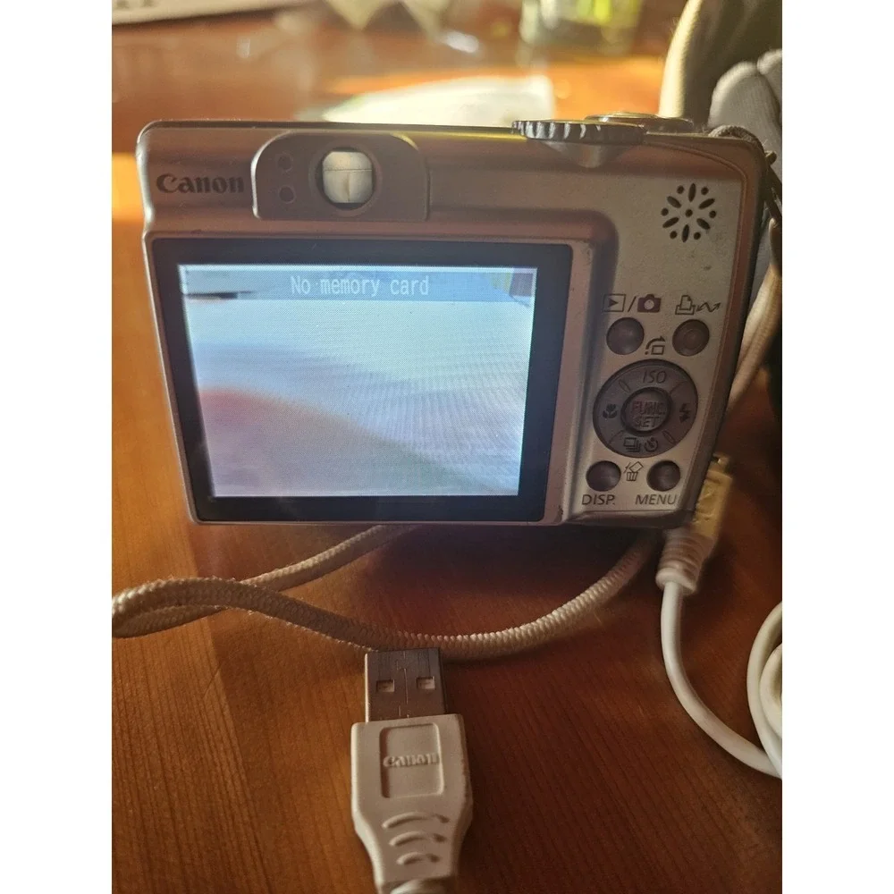 Canon PowerShot A560 7.1MP Digital Camera - Silver Read Description